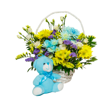Σύνθεση σε Καλάθι με Λουλούδια Εποχής και Πλούσιες Πρασινάδες,  Συνοδεύεται από Λούτρινο Αρκουδάκι